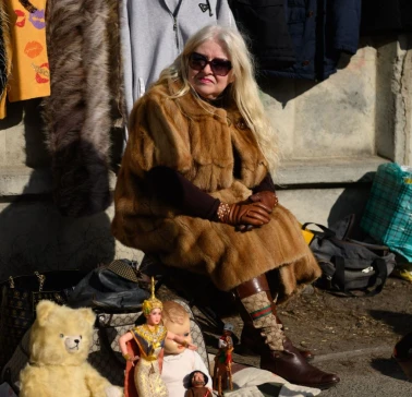 Selling vintage toys and clothes at a flea market near Pochayna in Kyiv
