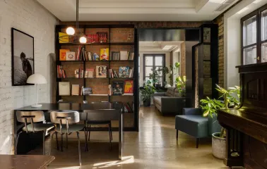 Bursa Hotel - stylish minimalist hotel hall with a unique sculptural chair