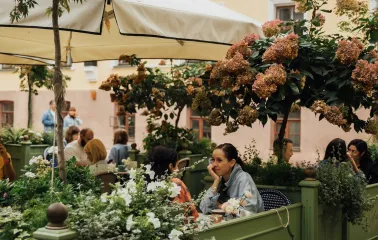 Etre Sofie - street terrace with comfortable seating and a view of the facade