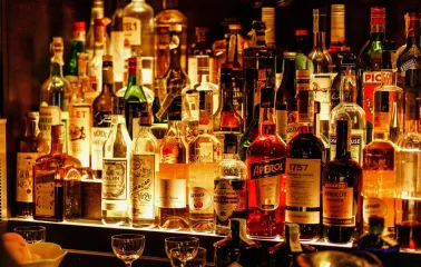 Hendricks Bar - close-up view of three brightly colored cocktails on the counter