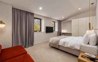 Sophia Hotel - luxurious hotel room with a chandelier and refined furnishings