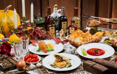Restaurant Za Dvoma Zaicyamy - banquet table with traditional Ukrainian dishes