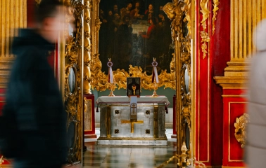 St. Andrew's Church in Kyiv - altar table with cross seen through open royal doors