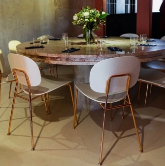 Pure Naive - overhead shot of a table with small plates of appetizers and wine