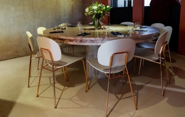 Pure Naive - overhead shot of a table with small plates of appetizers and wine