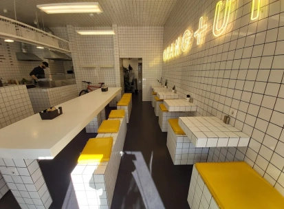 Fruit & Veg - bright interior with minimalist decor and wooden communal tables