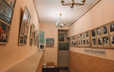 Koleso Theater in Kyiv - hallway featuring framed portraits of playwrights