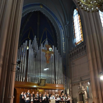Organ, choir and altar during a performance at St. Nicholas Church in Kyiv