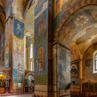 St. Cyril's Church in Kyiv - tall interior columns covered in ancient religious frescoes
