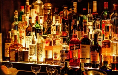 Hendricks Bar - close-up view of three brightly colored cocktails on the counter