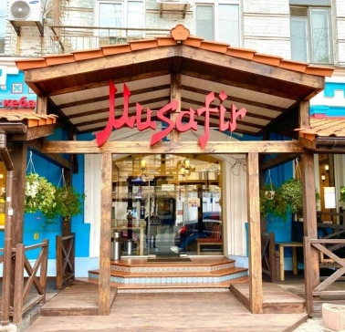 The entrance to the Musafir restaurant in Kyiv with traditional Crimean Tatar decor