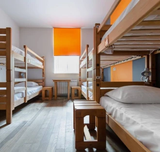 Dream Hostel - room with four bunk beds and a window
