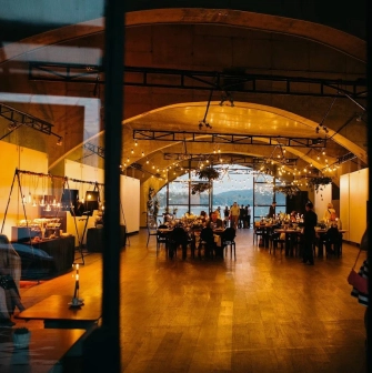 Art-Prychal - restaurant area with simple furniture and river views