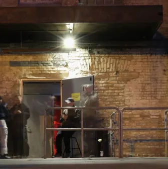 k41 - entrance to the club with guards and a sign "No photography allowed"