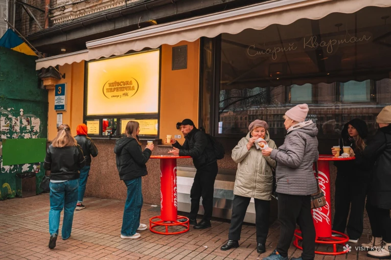 Kyivska Perepichka - busy terrace near "Kyivska Perepichka" where locals enjoy the famous fried dough sausage