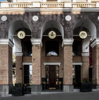 Entrance to NĂM restaurant in Kyiv