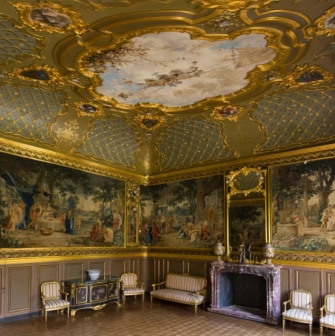 The Golden Hall of the Khanenko Museum with luxurious paintings and antique furniture