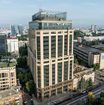 Senator Business Center in Kyiv - beige high-rise building facade with glass top