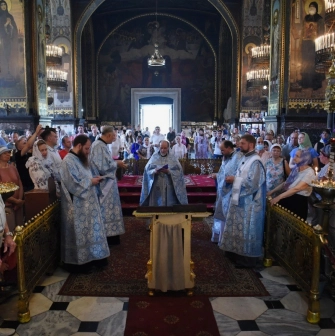 St. Volodymyr's Cathedral in Kyiv - interior view of service with priests in blue robes