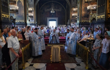 St. Volodymyr's Cathedral in Kyiv - interior view of service with priests in blue robes