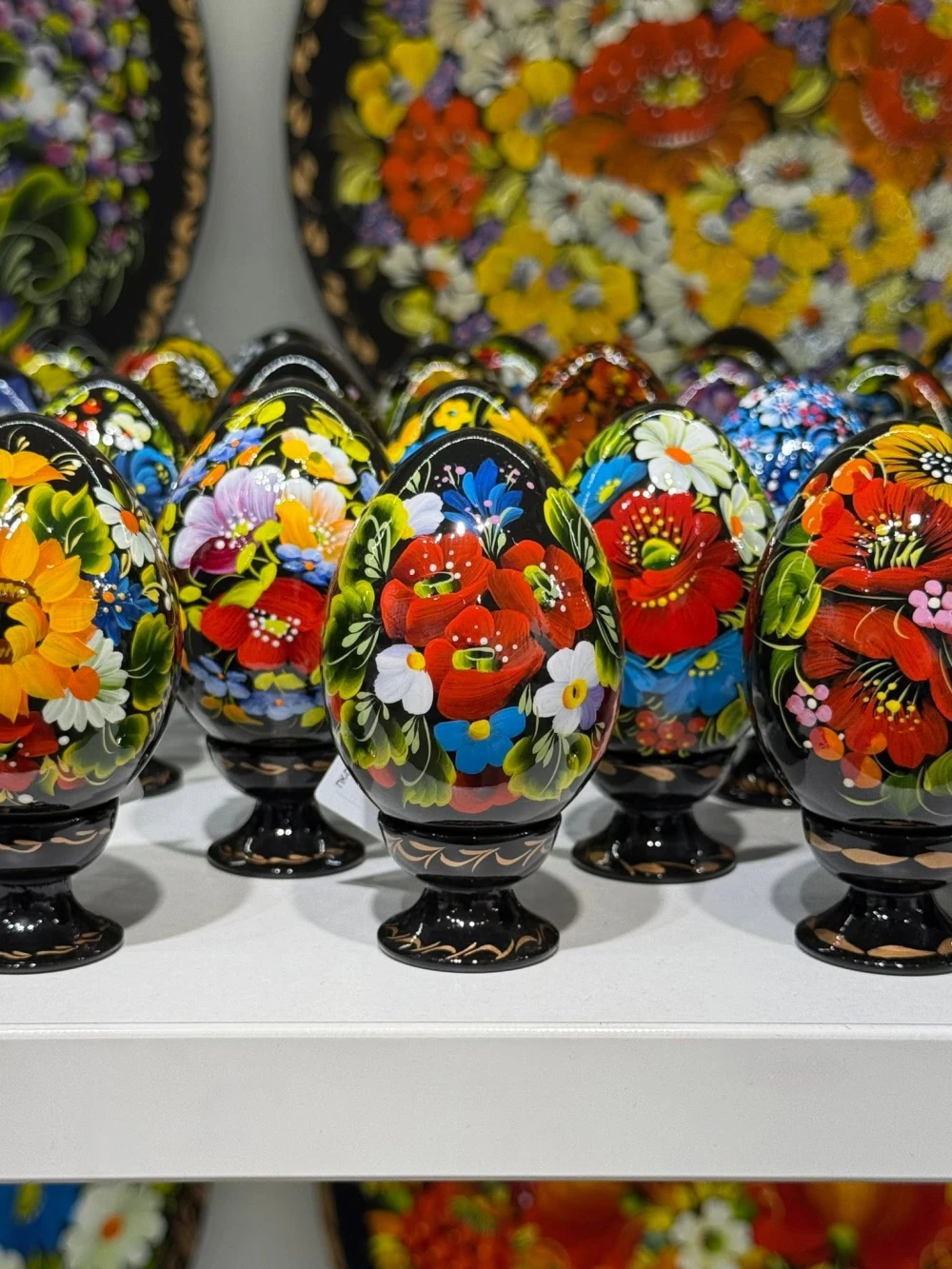 A collection of Easter pysanky with vibrant floral paintings