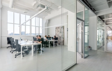 Meeting room behind a glass partition at Kooperativ in Kyiv