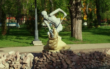 Sculpture near the fountain in Taras Shevchenko Park in Kyiv