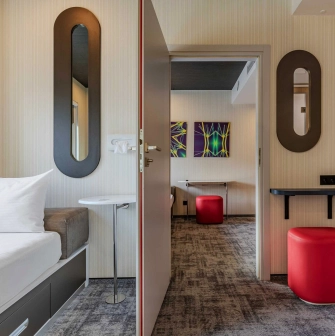 IQ Hotel - minimalist interior featuring bright lights and modern design