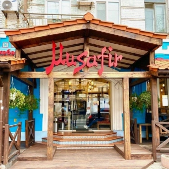 The entrance to the Musafir restaurant in Kyiv with traditional Crimean Tatar decor