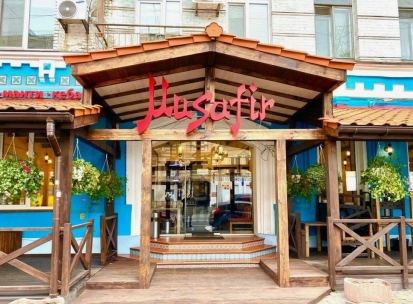 The entrance to the Musafir restaurant in Kyiv with traditional Crimean Tatar decor