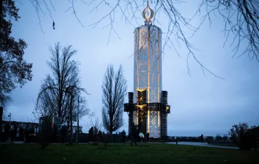 Holodomor Genocide Memorial in Kyiv with a tall candle monument