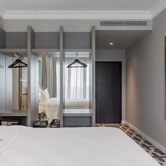 Modern wardrobe area in a room at the premium Edem hotel in Kyiv