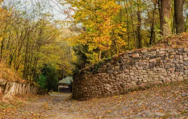 Pyrohiv Museum in Kyiv - stone path leading through autumn forest