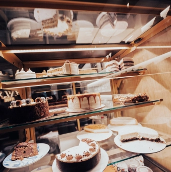 Takava in Kyiv - glass display case filled with various cakes and desserts