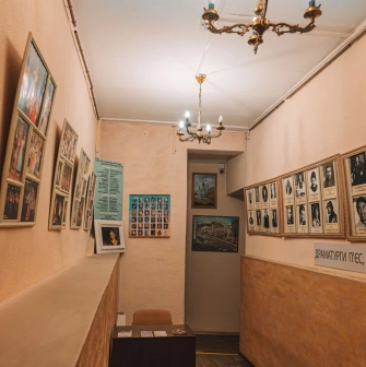 Koleso Theater in Kyiv - hallway featuring framed portraits of playwrights