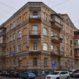 Vulytsia Reitarska in Kyiv - grand orange brick building with intricate architectural patterns