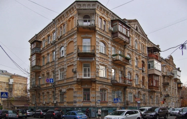 Vulytsia Reitarska in Kyiv - grand orange brick building with intricate architectural patterns