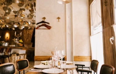 Fish Pussycat - spacious dining area with modern lighting and casual wooden furniture