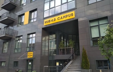 Entrance to HUB 4.0 Campus in Kyiv with a sign above the stairs