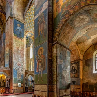 St. Cyril's Church in Kyiv - tall interior columns covered in ancient religious frescoes