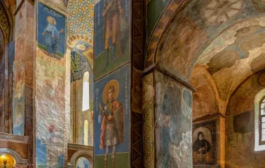 St. Cyril's Church in Kyiv - tall interior columns covered in ancient religious frescoes