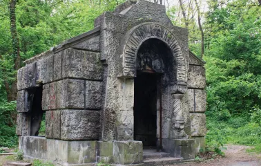Babyn Yar in Kyiv - mysterious ruins of the historic Kaczkowski family crypt featuring weathered stone walls
