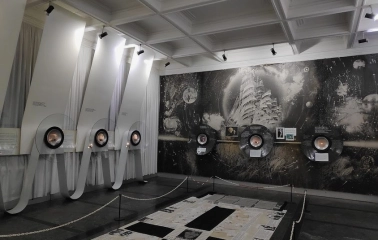 Museum of Microminiatures of Mykola Syadrystoho in Kyiv – an exhibition hall with round viewing lenses for observing microscopic art
