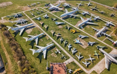 State Aviation Museum in Kyiv - aerial view of the vast open-air collection featuring dozens of helicopters and airplanes