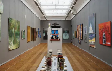 Kyivska Kartynna Halereia in Kyiv - long gallery corridor with skylights, modern art and an installation in the center