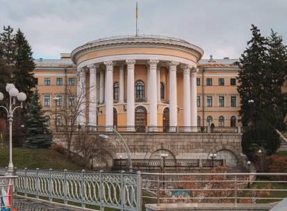 October Palace in Kyiv - exterior view of the yellow rotunda with white columns