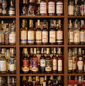 An extensive collection of elite whisky on the shelves at the "Whisky Corner" bar in Kyiv