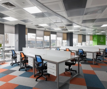 Peremoga Space - open-plan workspace with multiple desks and ergonomic chairs