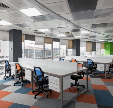 Peremoga Space - open-plan workspace with multiple desks and ergonomic chairs
