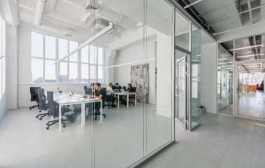 Meeting room behind a glass partition at Kooperativ in Kyiv